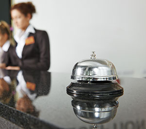 Bell on hotel front desk