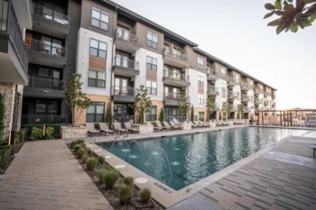 Pool with landscaping at a commercial property.