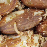 Indian Meal Moth larvae feeding on stored almonds before stored product pest control services from Bug Out